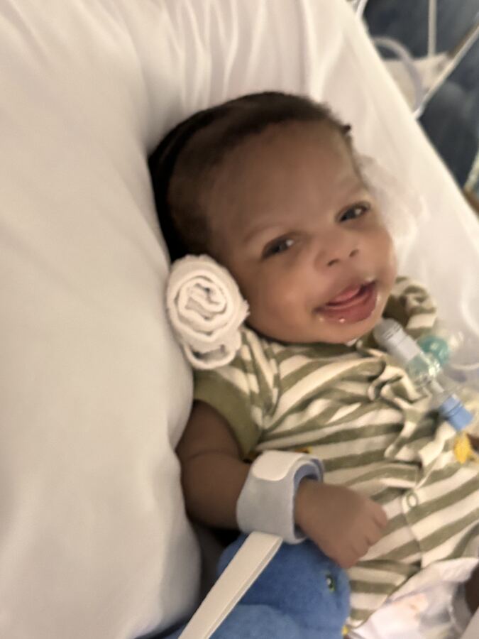 Myles smiling in the hospital.