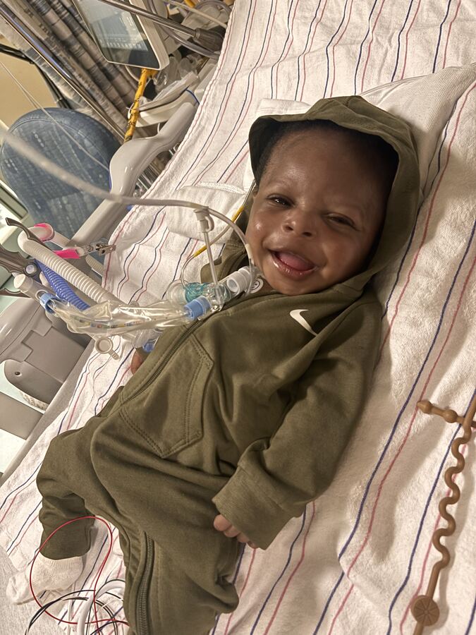 Myles smiling in the hospital.