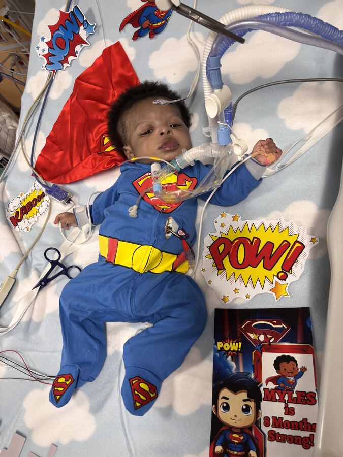 Myles dressed as Superman, 8 months strong.